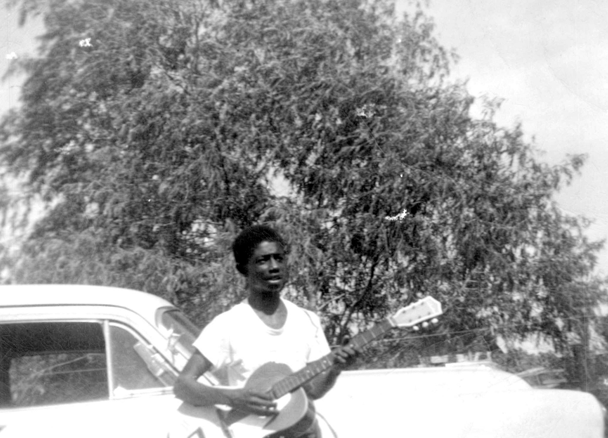 Young Cleveland Francis beside the willow tree. Courtesy of Forager Records.